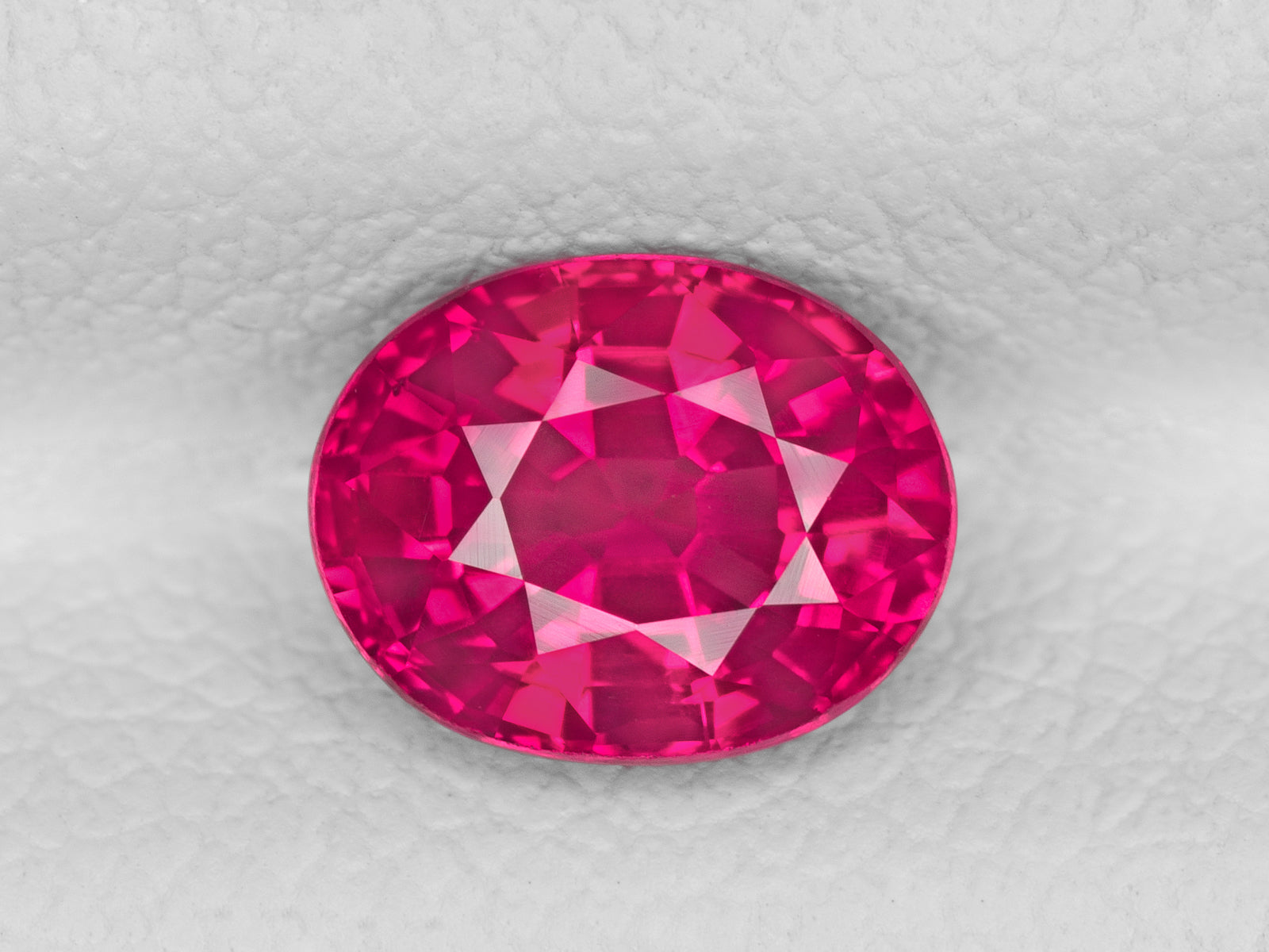 8802608-oval-fiery-neon-pinkish-red-grs-gii-mozambique-natural-ruby-1.28-ct