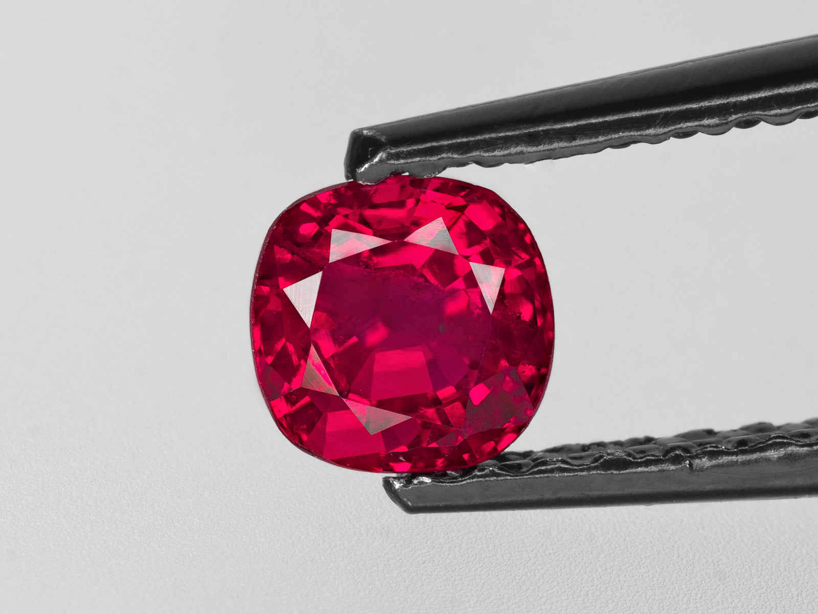 8802612-cushion-fiery-vivid-pigeon-blood-red-grs-burma-natural-ruby-0.79-ct