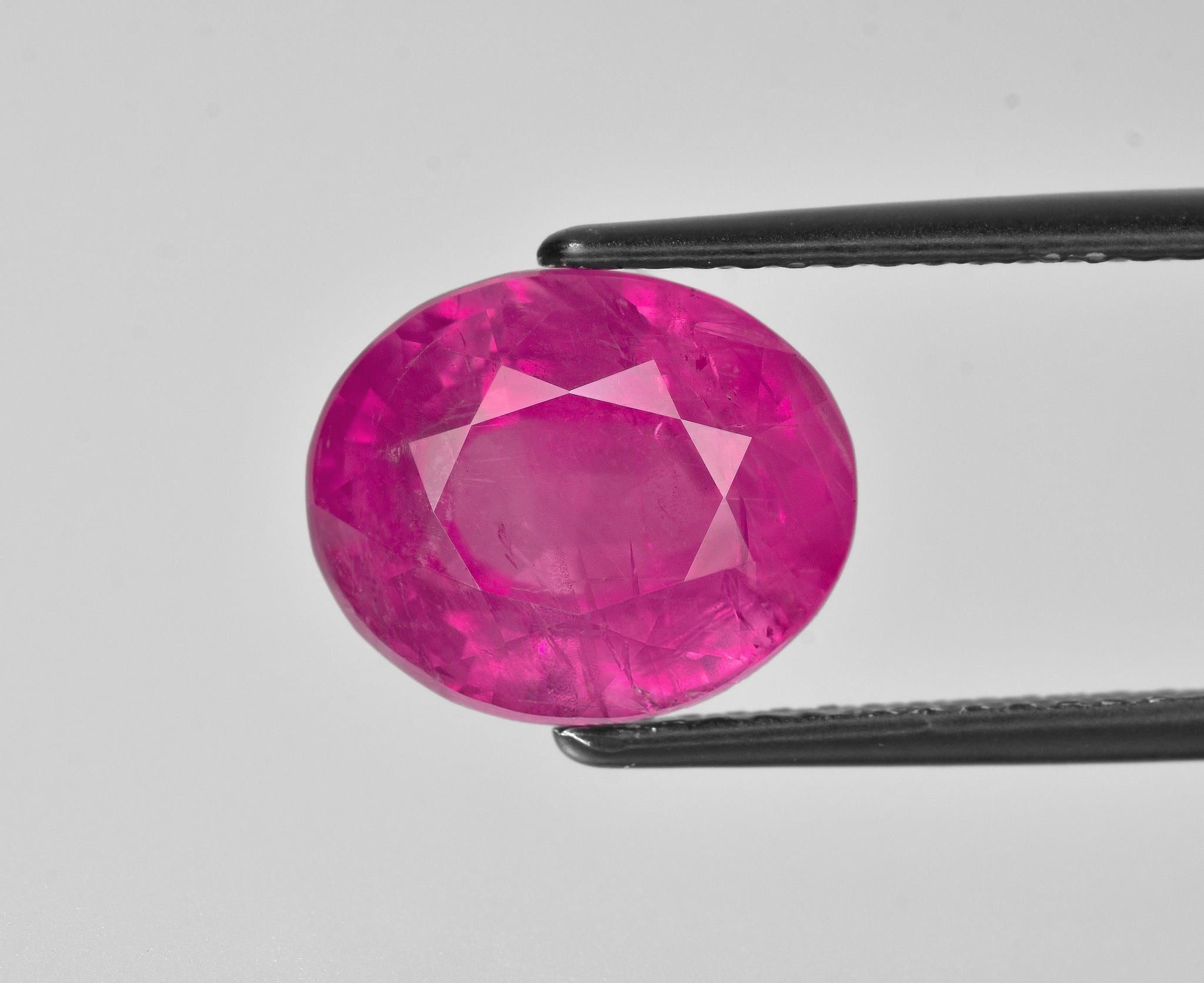 8801959-oval-pinkish-red-grs-burma-natural-ruby-9.74-ct