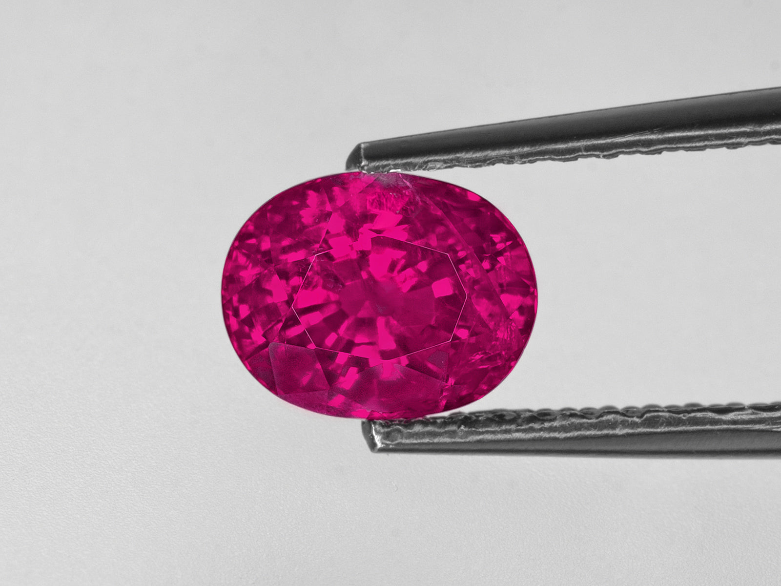 8802805-oval-fiery-vivid-purplish-red-gia-burma-natural-ruby-2.28-ct