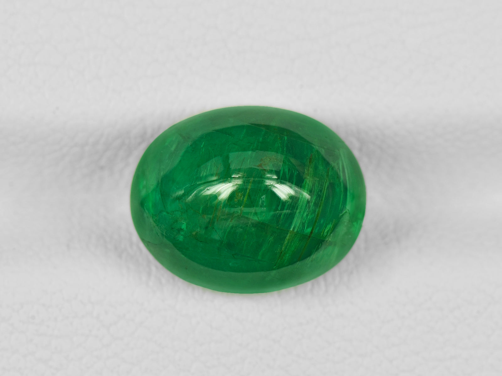 8802179-cabochon-deep-green-igi-zambia-natural-emerald-5.76-ct
