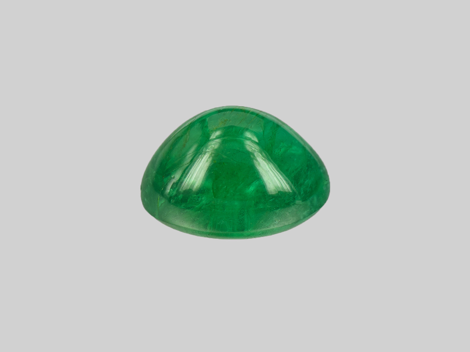 8802179-cabochon-deep-green-igi-zambia-natural-emerald-5.76-ct