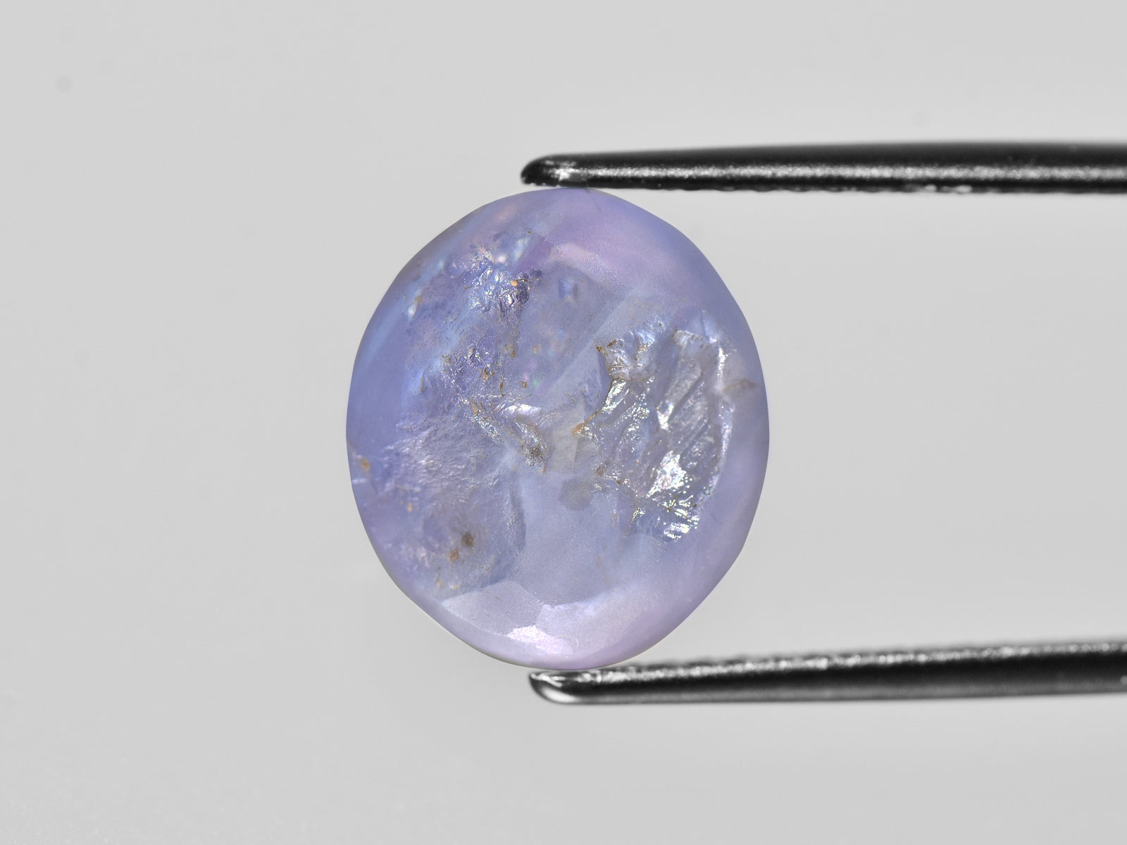 8801964-cabochon-violet-gia-sri-lanka-natural-fancy-star-sapphire-12.84-ct