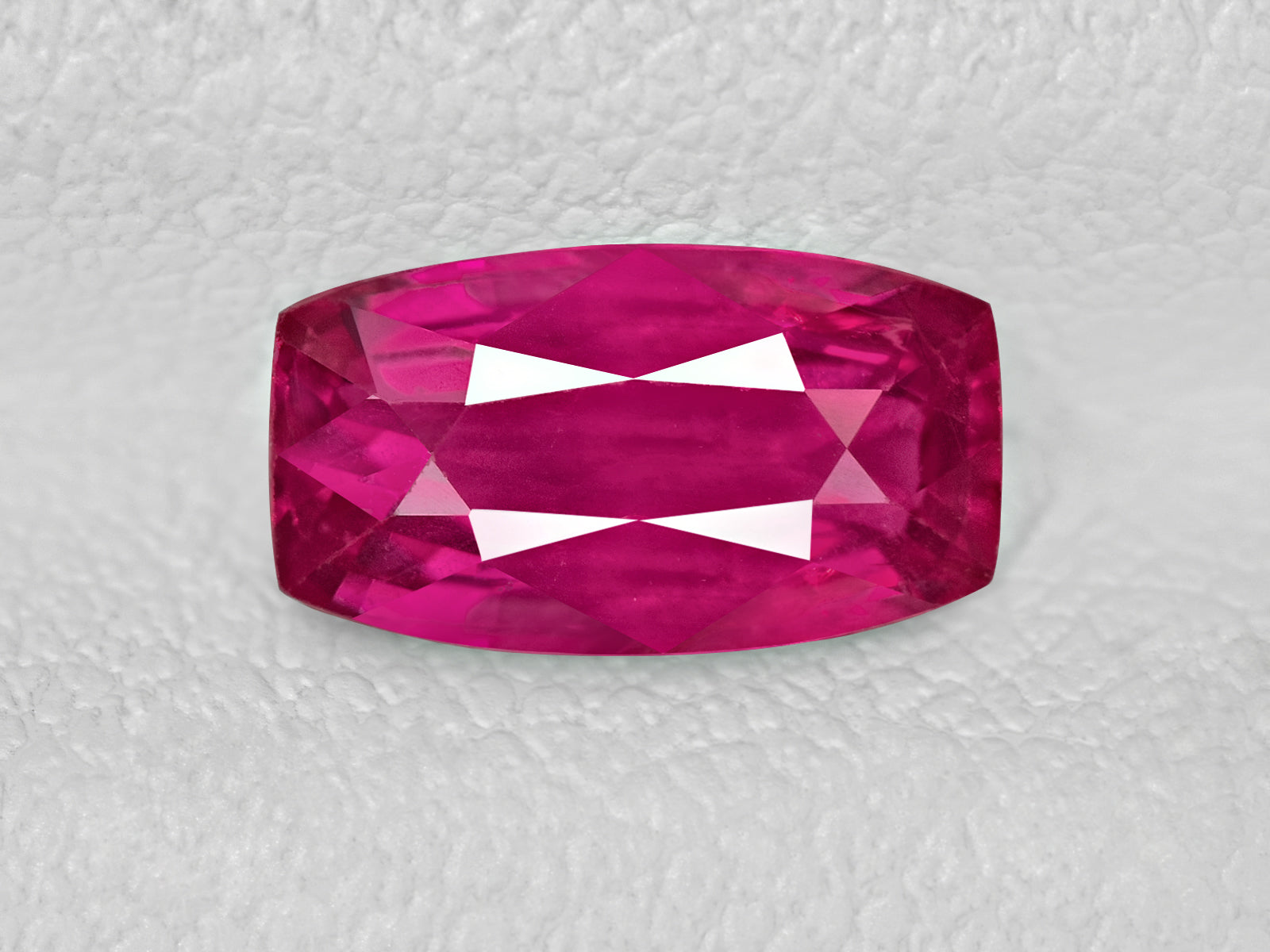8802025-cushion-fiery-vivid-pinkish-red-igi-mozambique-natural-ruby-1.09-ct