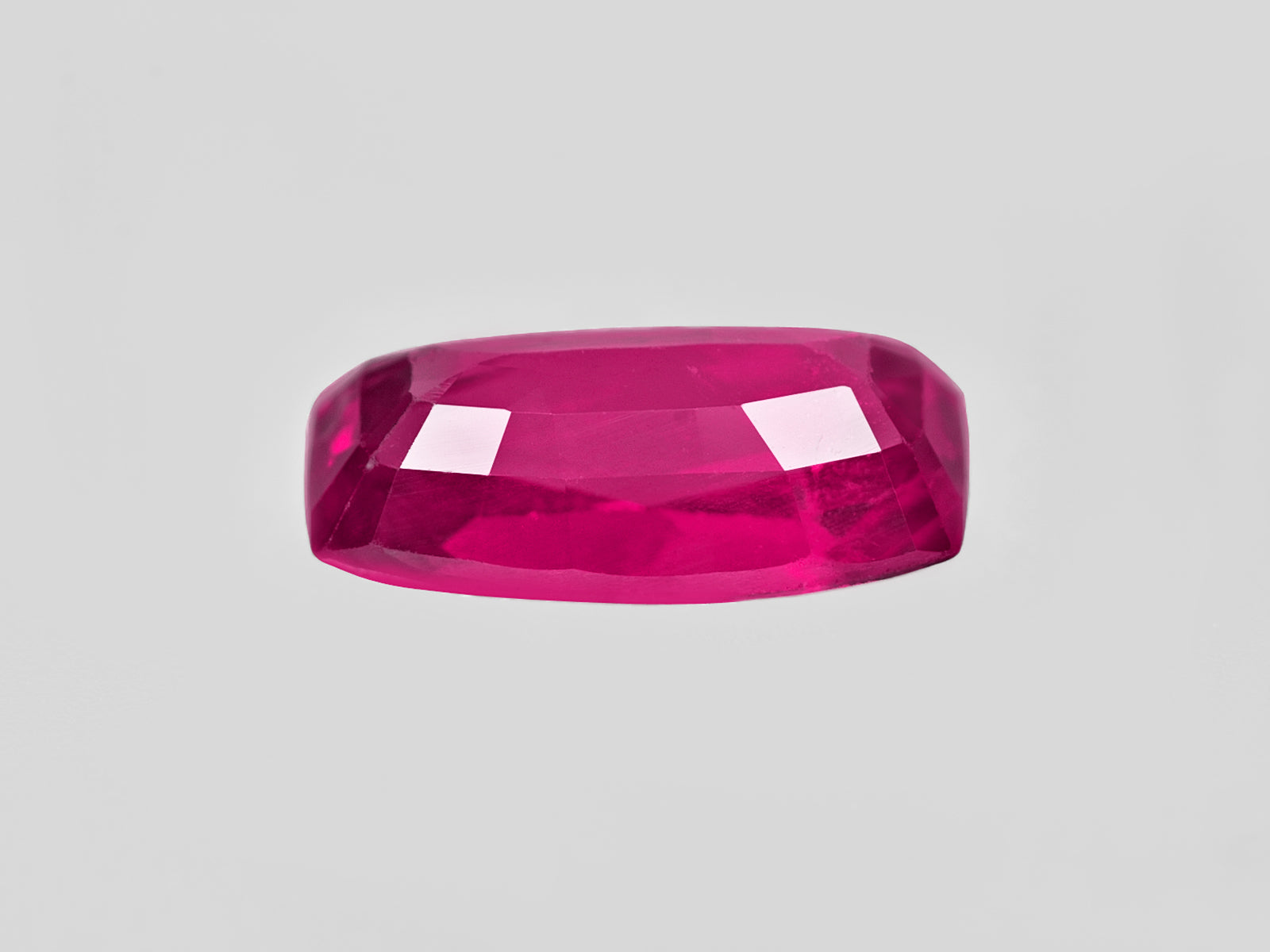 8802025-cushion-fiery-vivid-pinkish-red-igi-mozambique-natural-ruby-1.09-ct