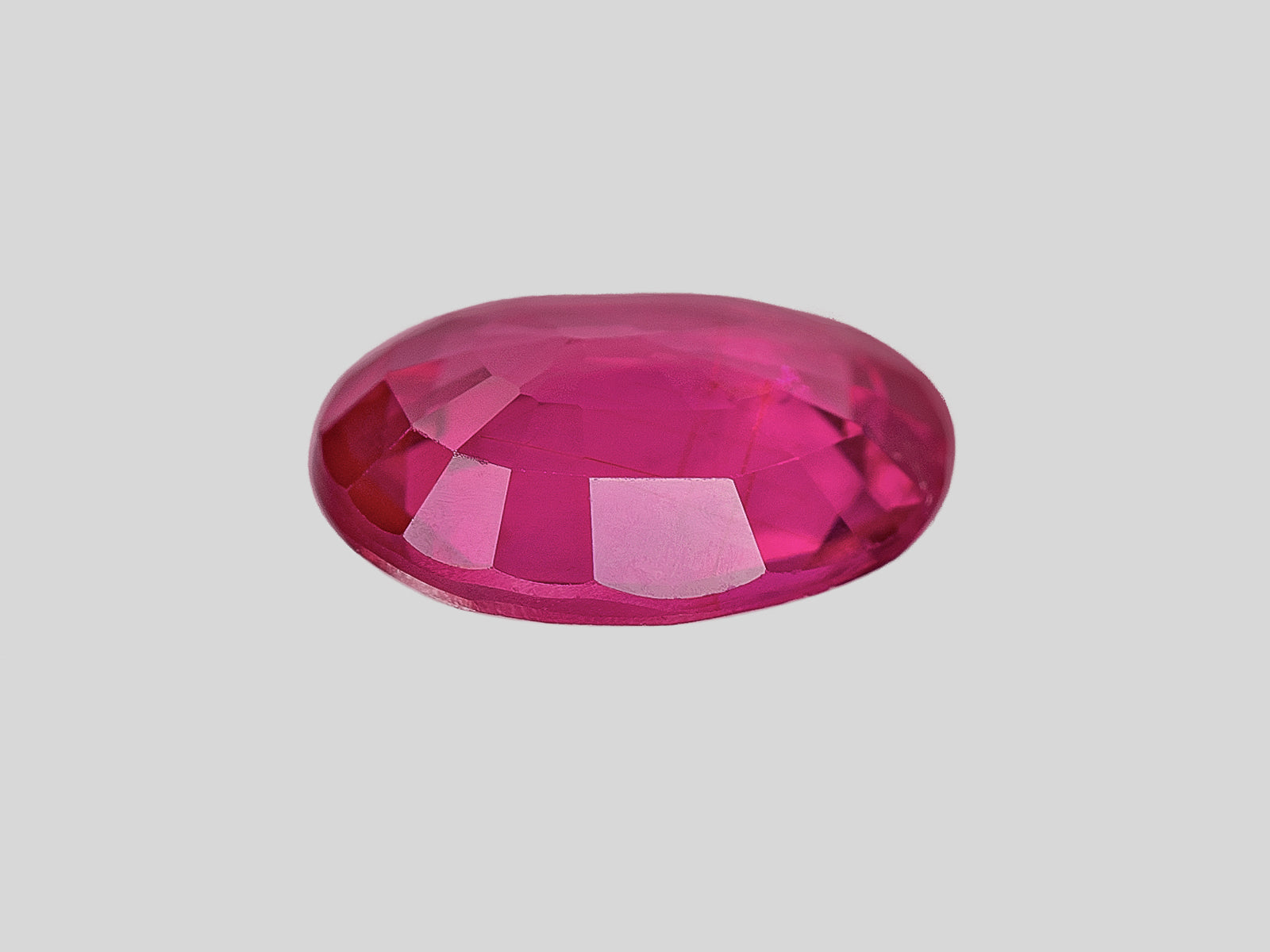 8802027-oval-deep-pinkish-red-igi-mozambique-natural-ruby-1.03-ct
