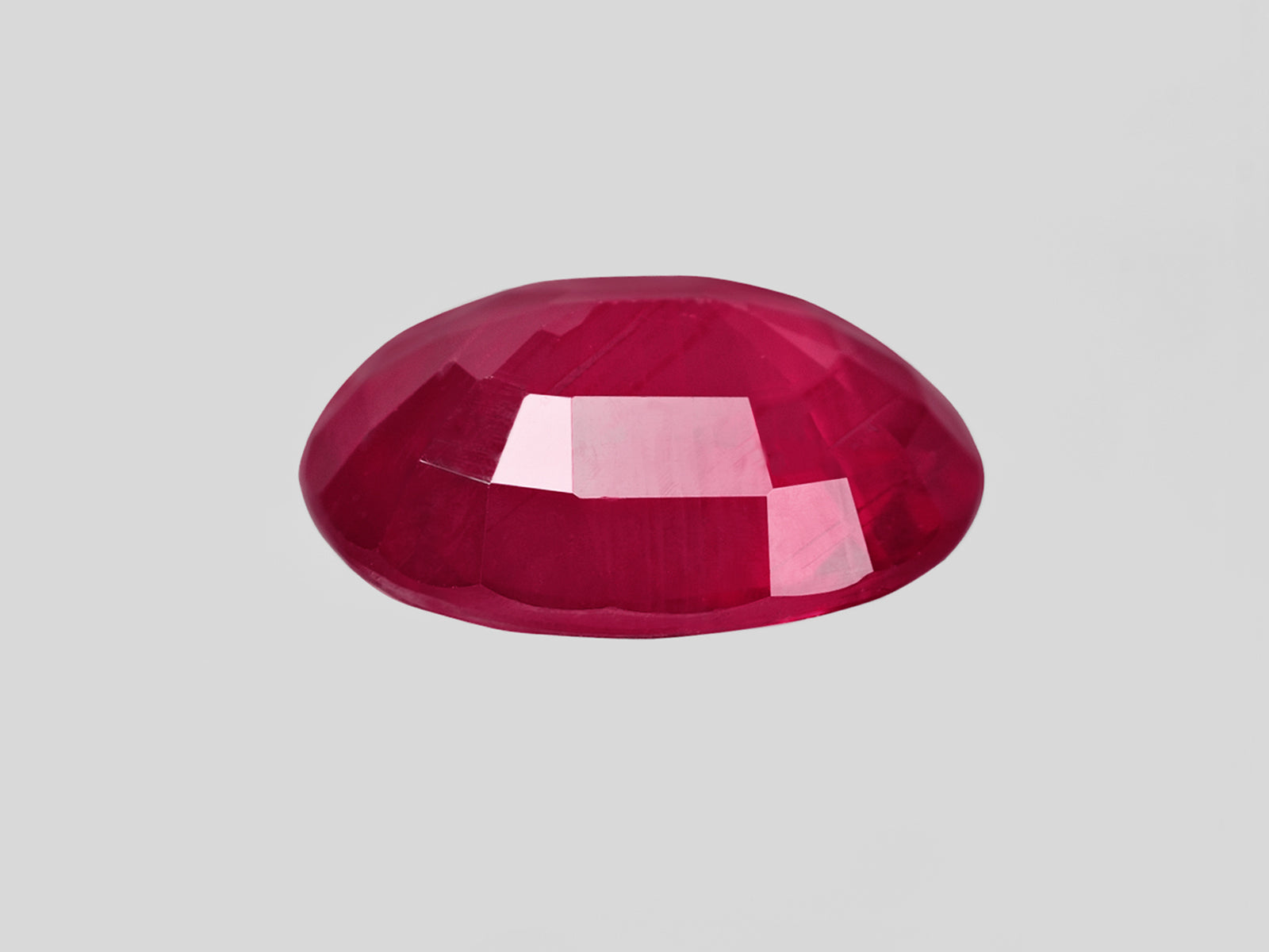 8802030-oval-rich-velvety-pinkish-red-igi-mozambique-natural-ruby-1.28-ct