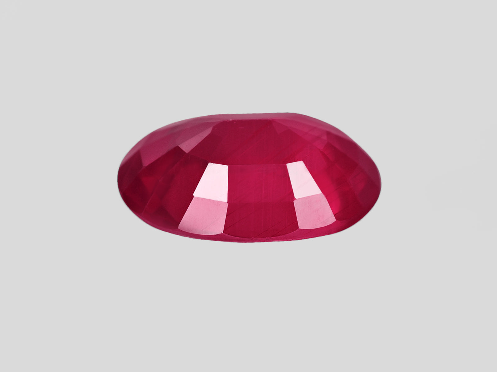 8802030-oval-rich-velvety-pinkish-red-igi-mozambique-natural-ruby-1.28-ct