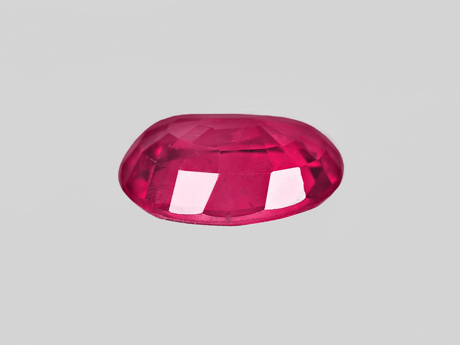 8802033-oval-deep-pinkish-red-igi-mozambique-natural-ruby-1.01-ct