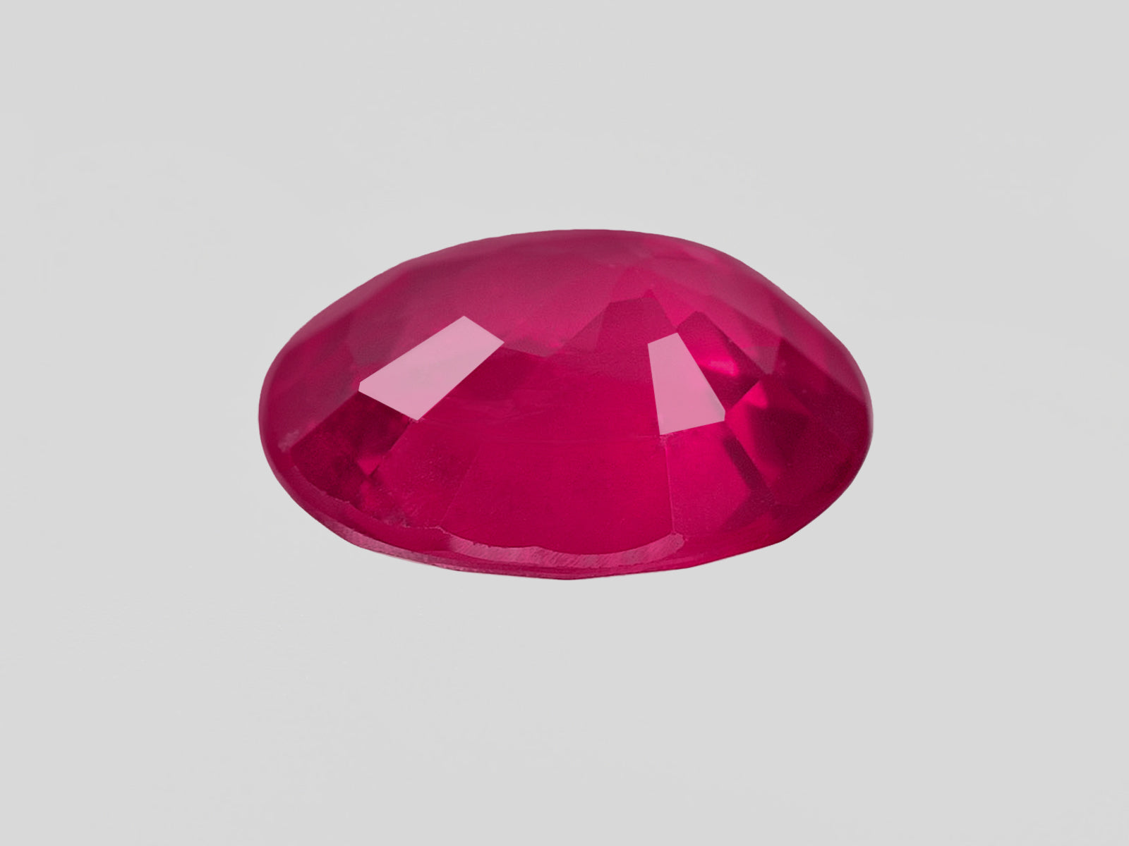 8802034-oval-velvety-deep-pinkish-red-igi-mozambique-natural-ruby-1.20-ct