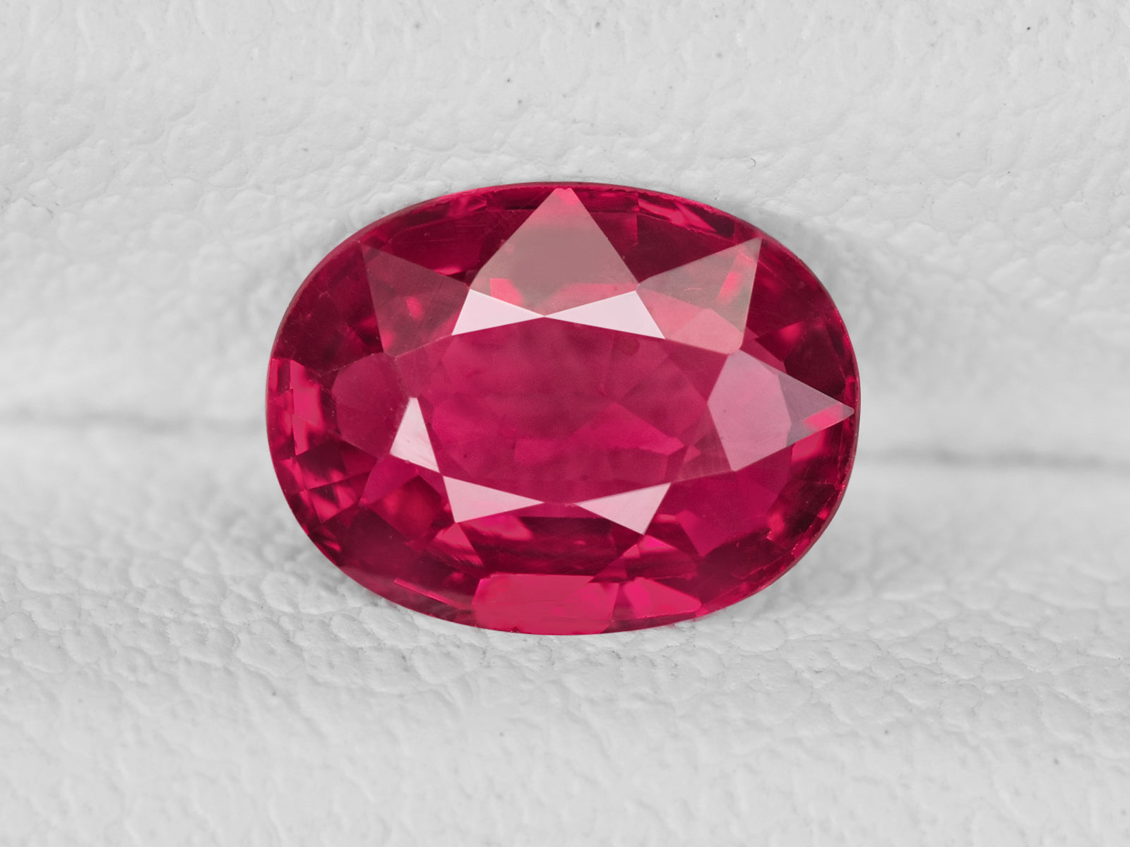 8802039-oval-rich-pinkish-red-igi-mozambique-natural-ruby-1.03-ct