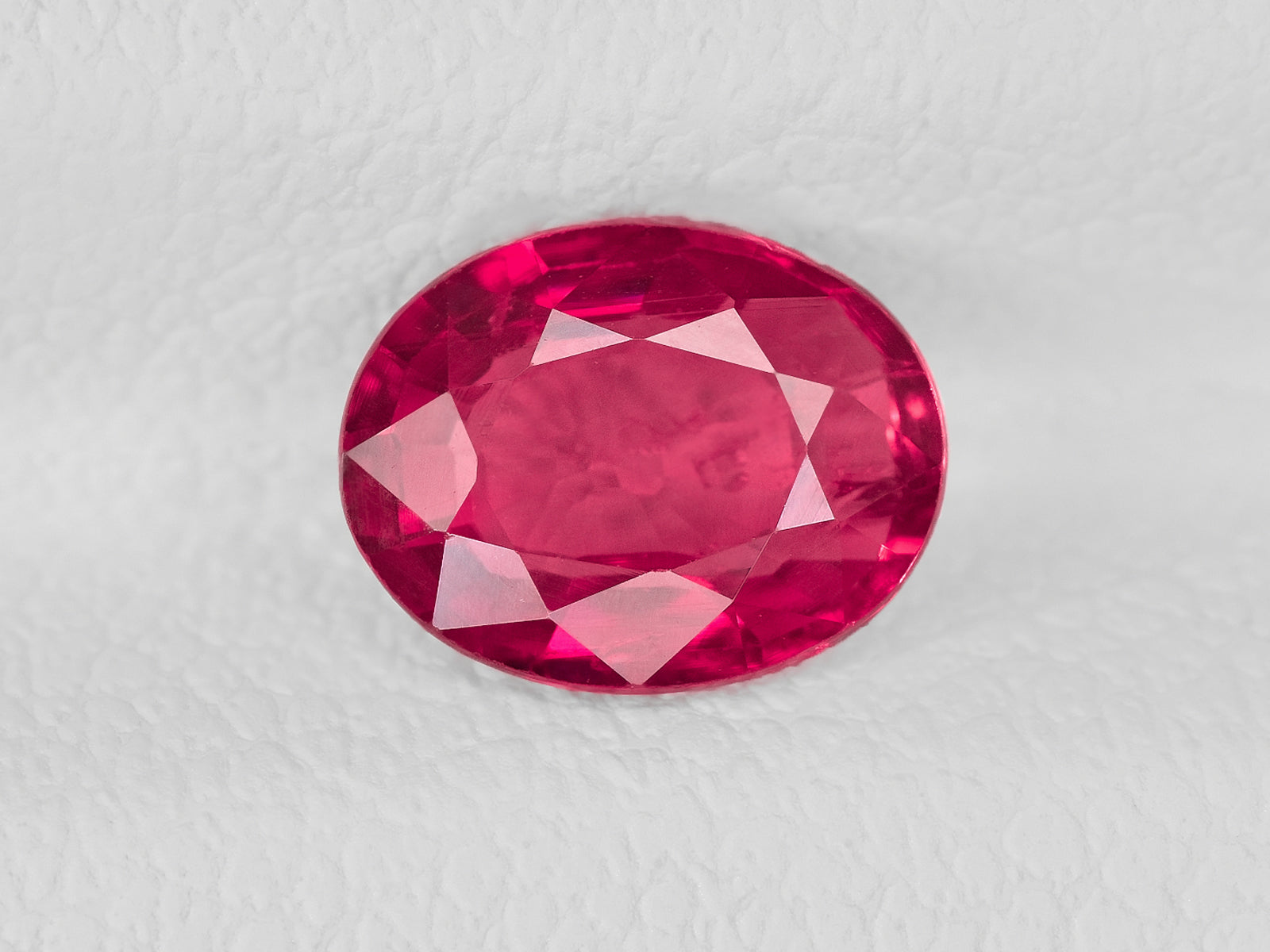 8802040-oval-pinkish-red-igi-mozambique-natural-ruby-1.01-ct