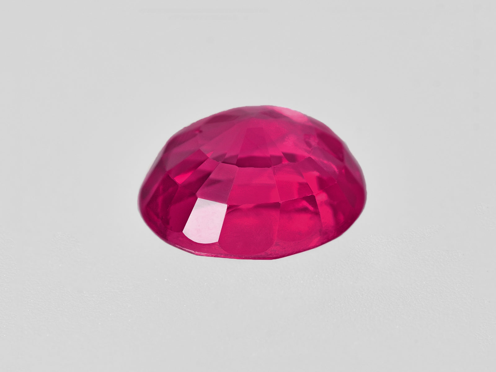8802042-oval-fiery-neon-pinkish-red-igi-mozambique-natural-ruby-1.00-ct