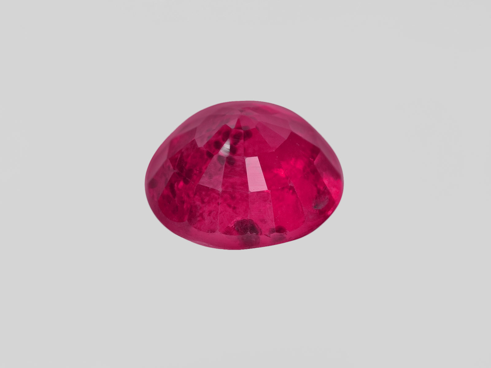 8802043-round-rich-intense-pinkish-red-igi-mozambique-natural-ruby-1.00-ct