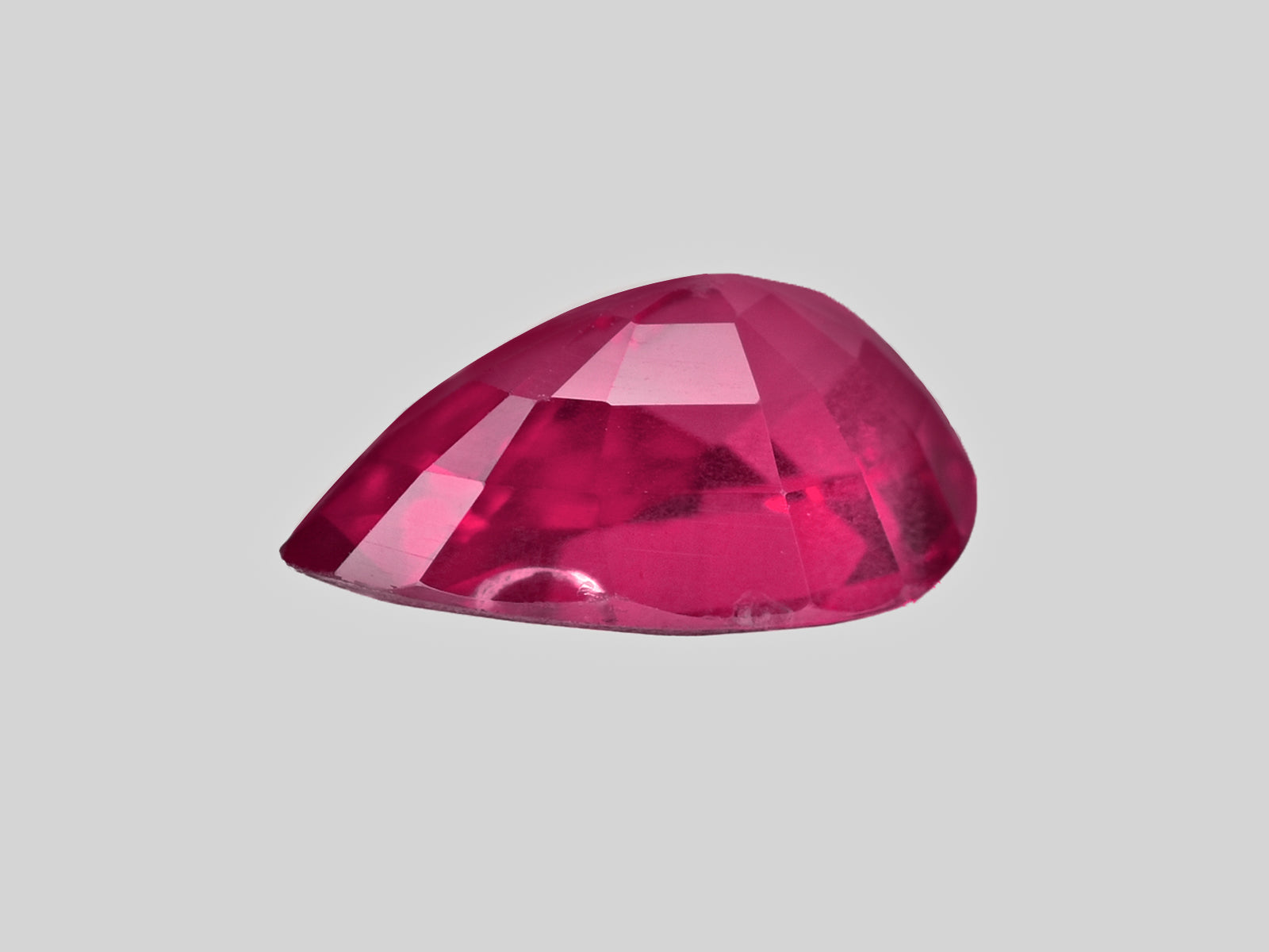 8802044-pear-fiery-pinkish-red-igi-mozambique-natural-ruby-1.17-ct
