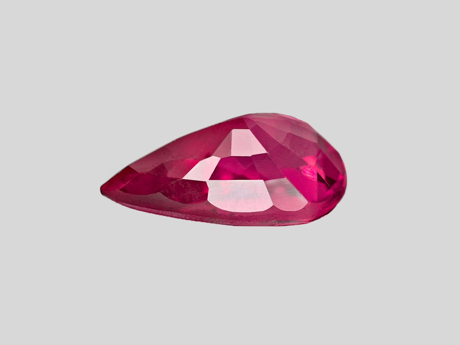 8802045-pear-fiery-intense-pinkish-red-igi-mozambique-natural-ruby-1.01-ct