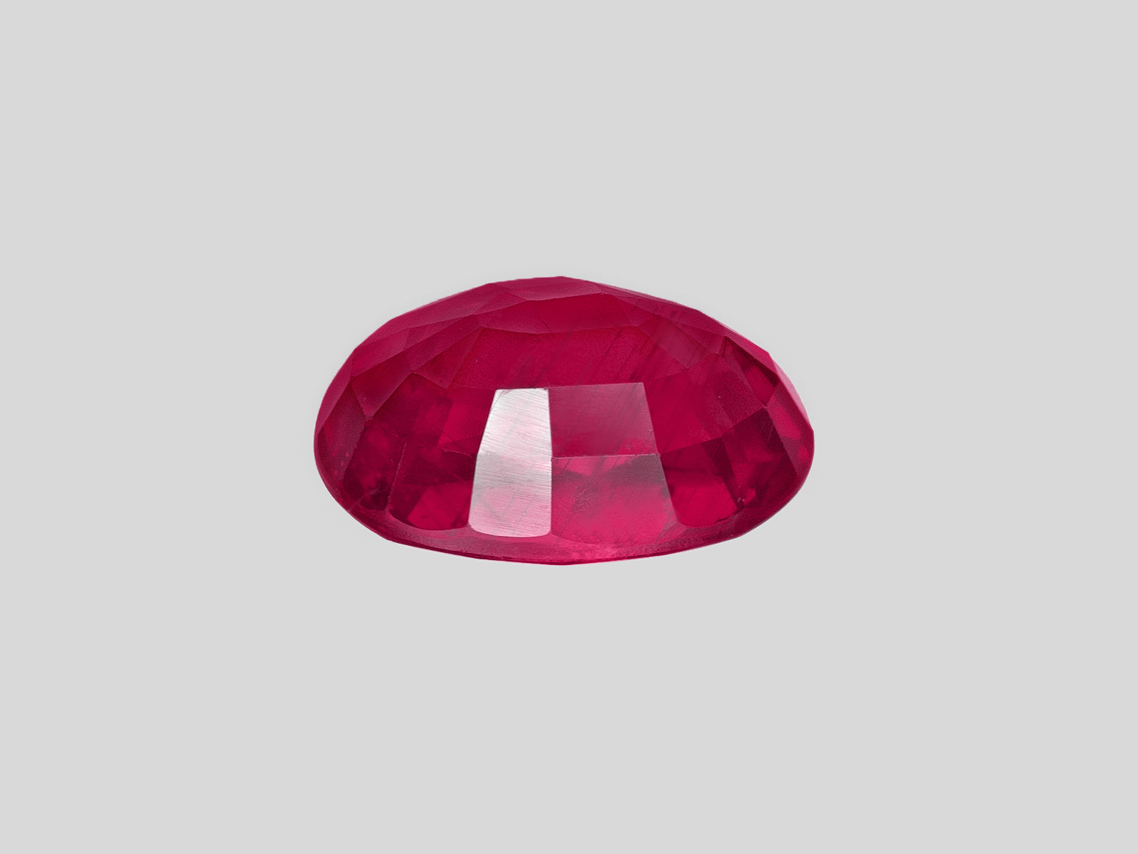 8802616-oval-deep-pinkish-red-gia-mozambique-natural-ruby-2.05-ct