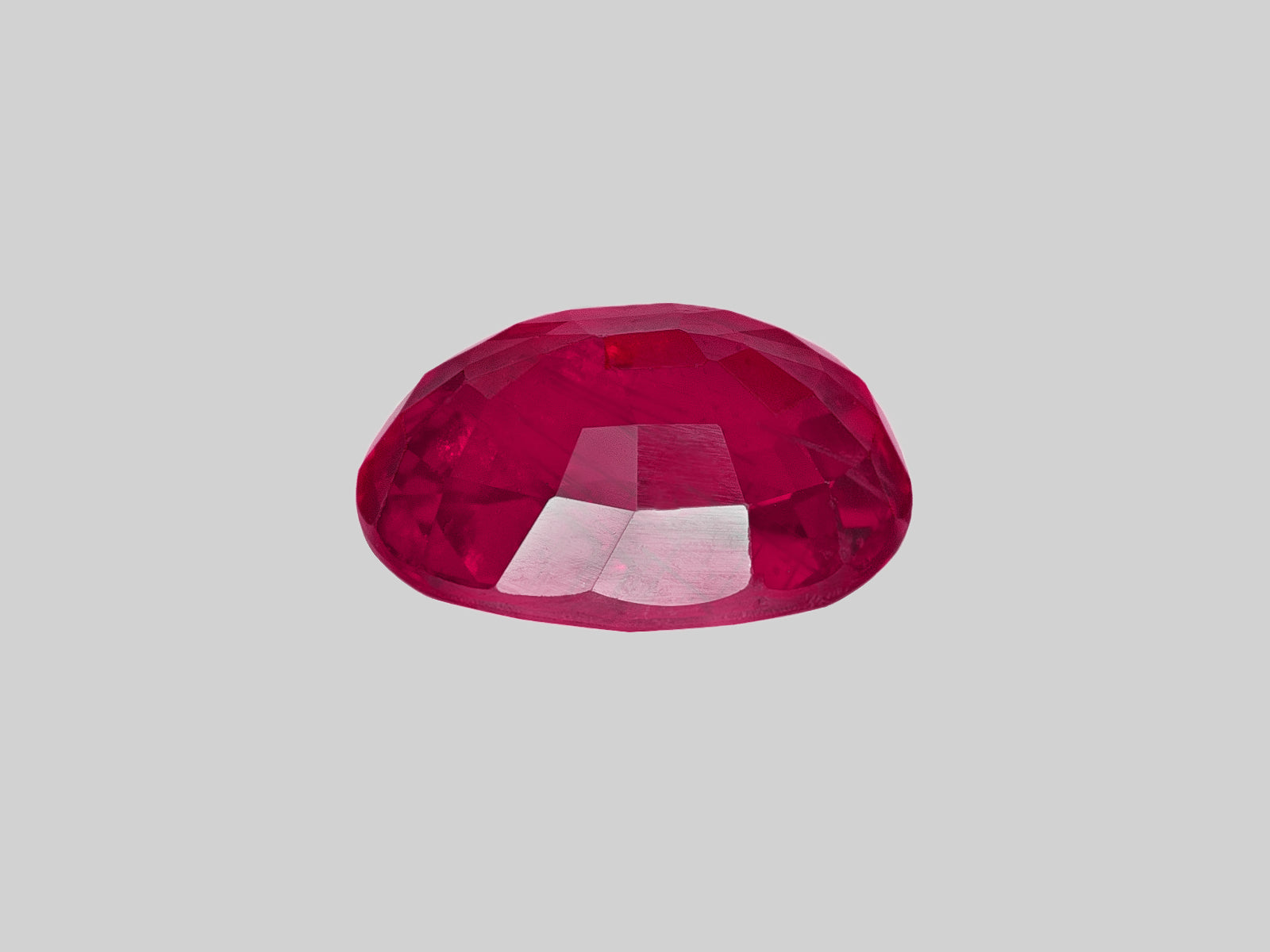8802616-oval-deep-pinkish-red-gia-mozambique-natural-ruby-2.05-ct