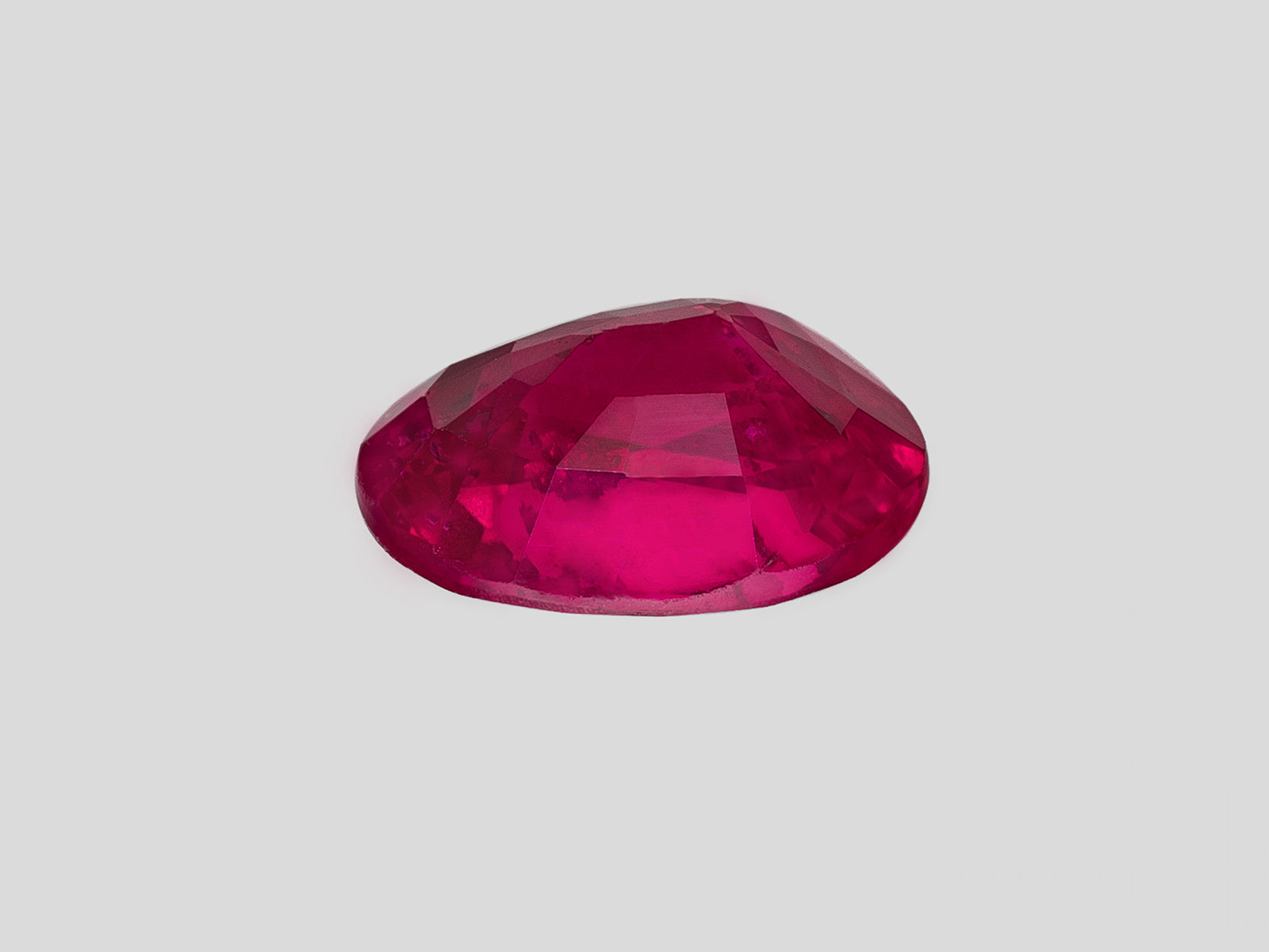 8802619-oval-fiery-vivid-pinkish-red-gia-mozambique-natural-ruby-2.01-ct