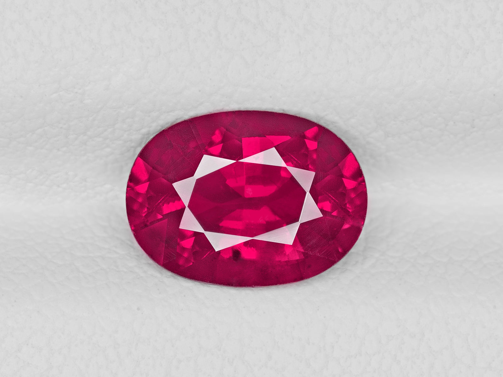 8802620-oval-velvety-rich-pinkish-red-gia-mozambique-natural-ruby-2.04-ct