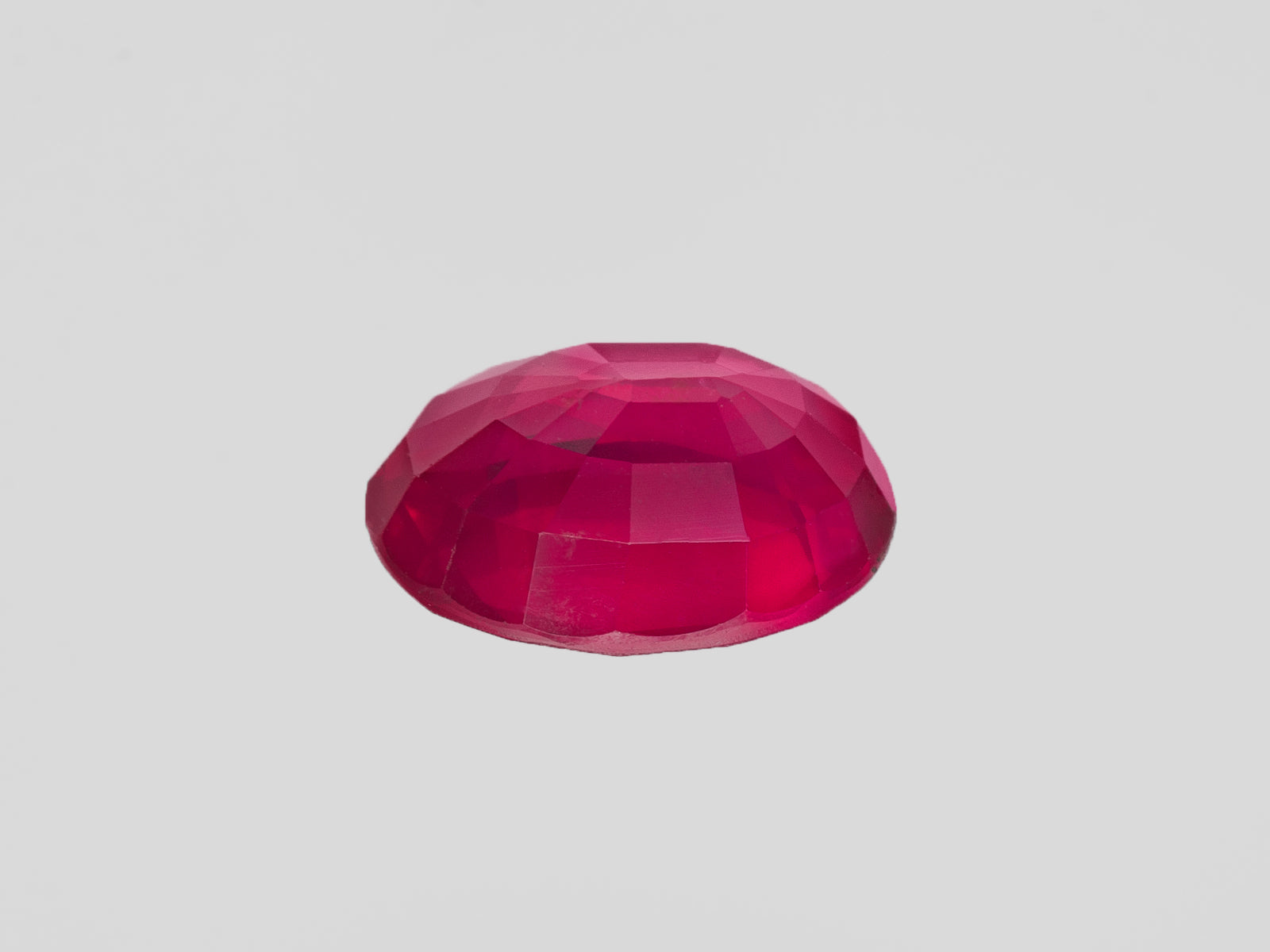 8802618-oval-velvety-pinkish-red-gia-mozambique-natural-ruby-2.10-ct