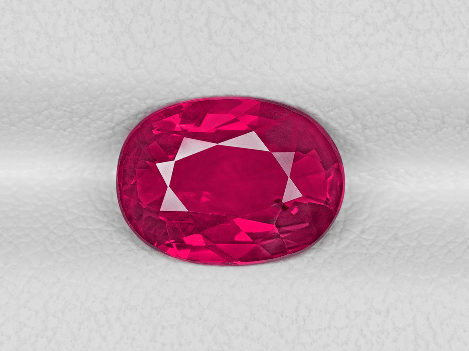 8802621-oval-vivid-pinkish-red-gia-mozambique-natural-ruby-2.01-ct