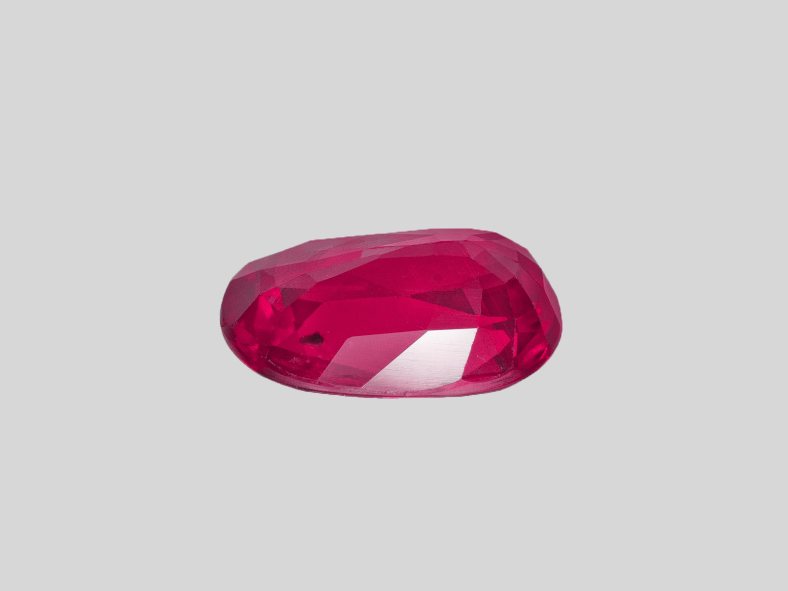 8802621-oval-vivid-pinkish-red-gia-mozambique-natural-ruby-2.01-ct