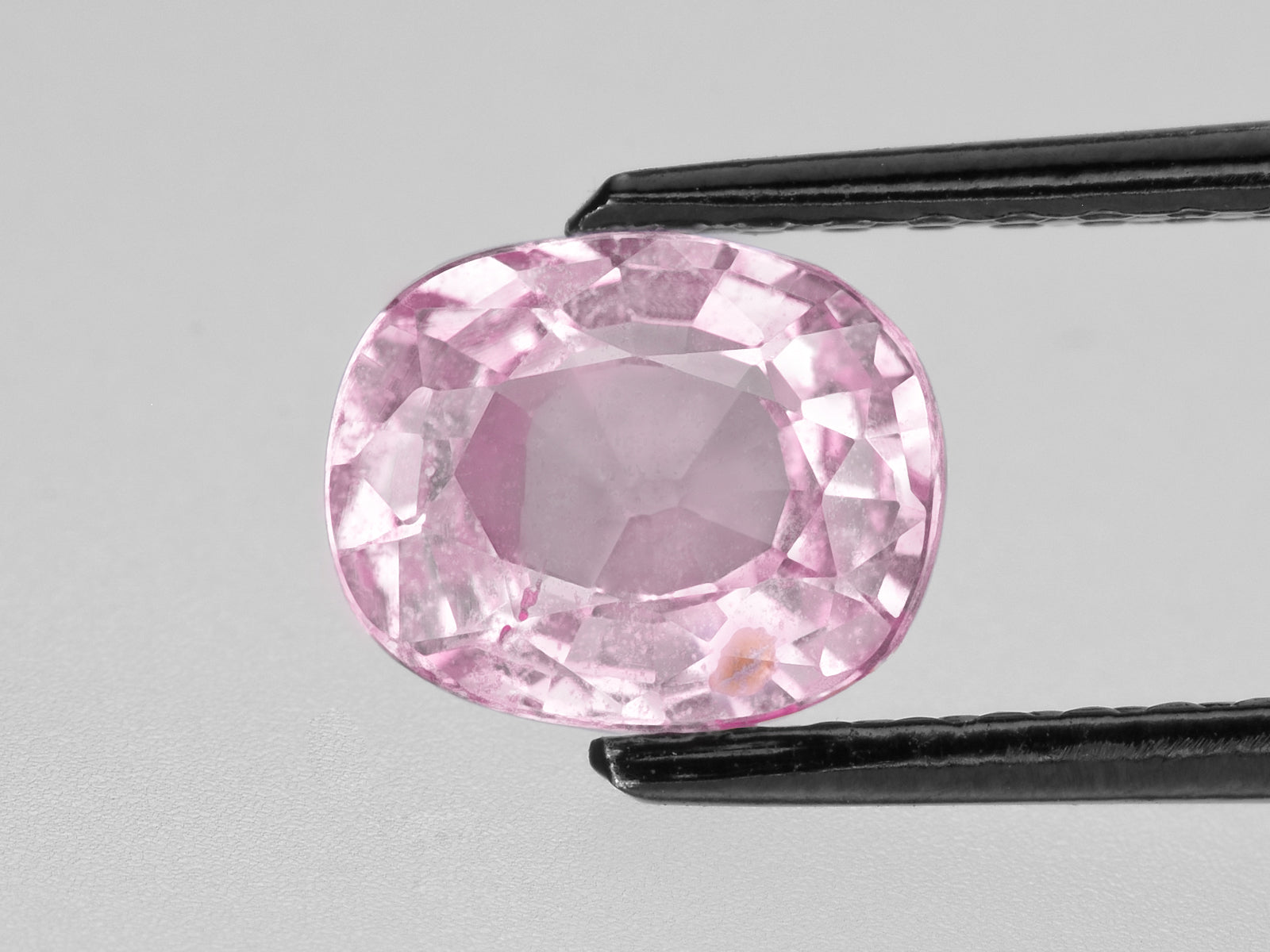 8802242-oval-soft-orangy-pink-grs-madagascar-natural-padparadscha-1.53-ct