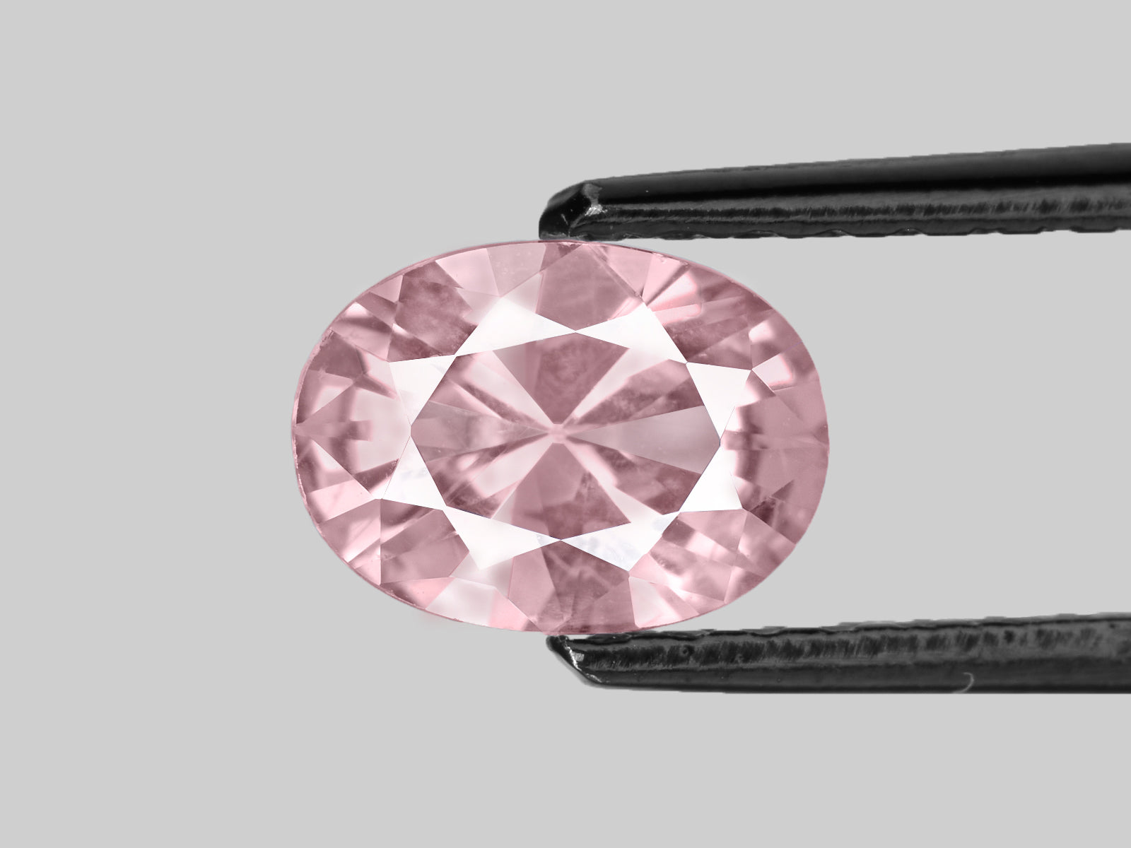 8802250-oval-lustrous-soft-orangy-pink-gia-madagascar-natural-padparadscha-1.18-ct