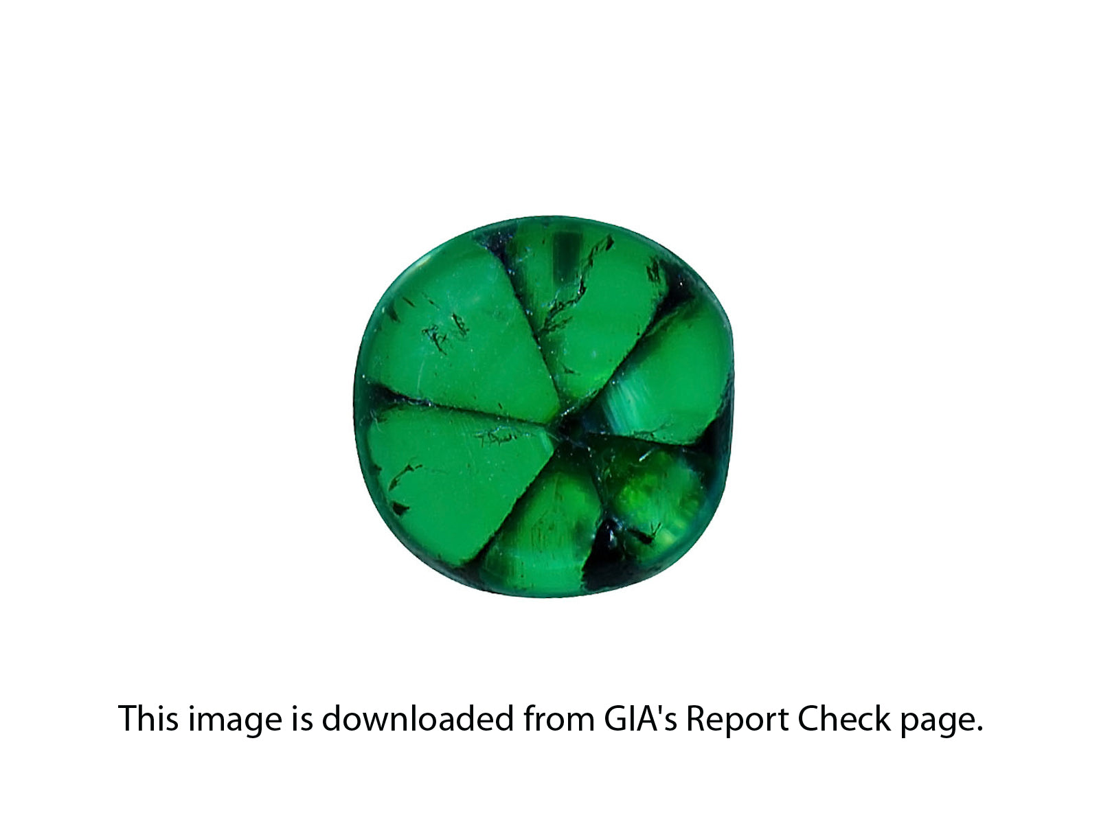 8802207-cabochon-lively-intense-green-with-black-spokes-gia-colombia-natural-trapiche-emerald-3.57-ct