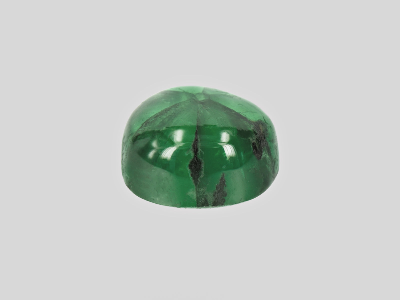 8802213-cabochon-deep-green-with-black-spokes-gia-colombia-natural-trapiche-emerald-4.81-ct