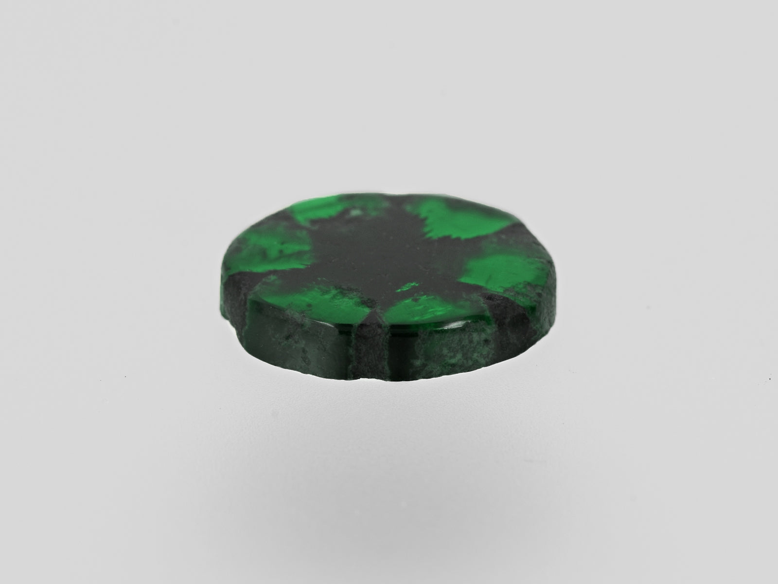 8802215-cabochon-royal-green-with-black-spokes-gia-colombia-natural-trapiche-emerald-2.75-ct
