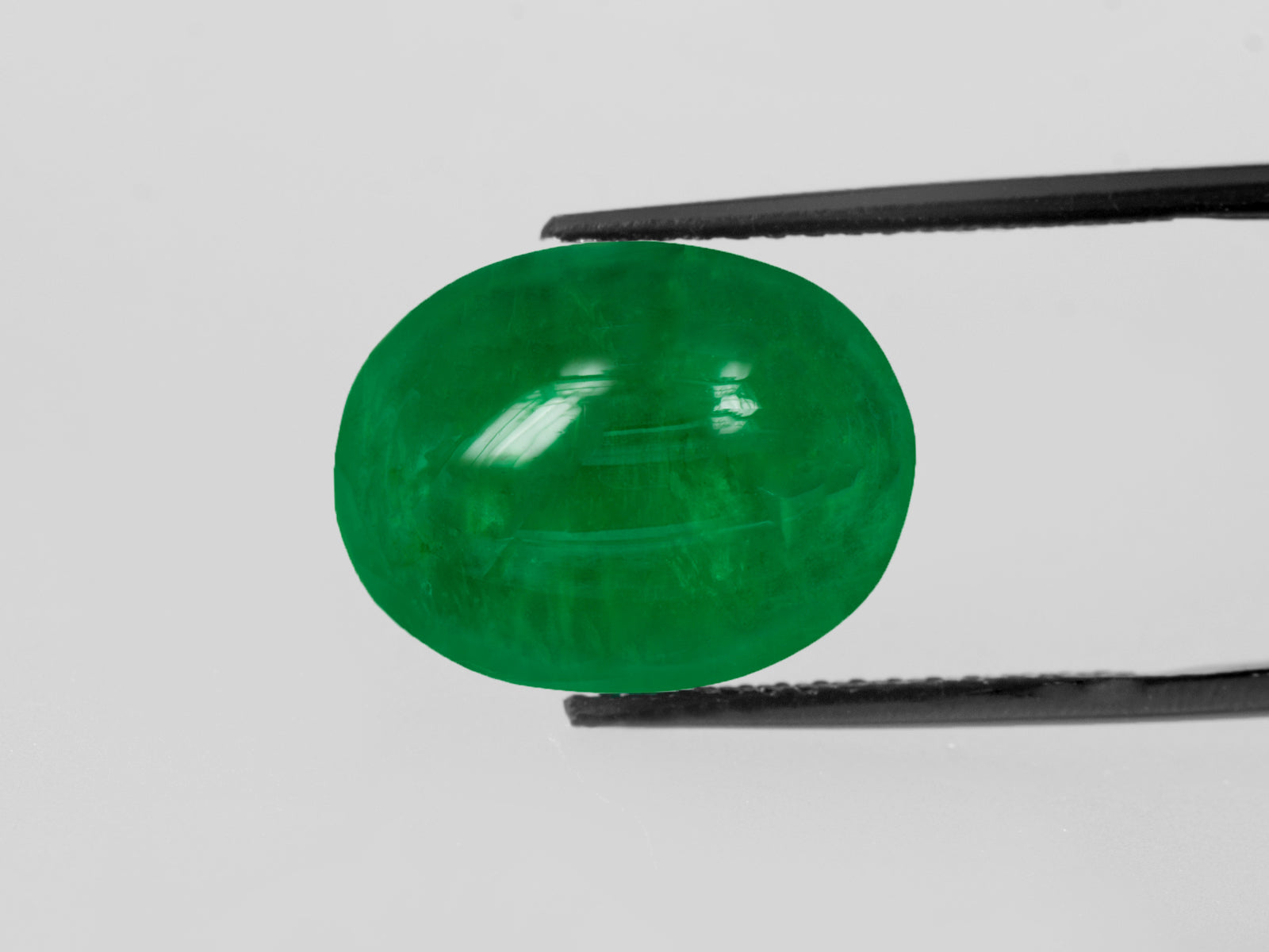 8802823-cabochon-rich-intense-green-grs-brazil-natural-emerald-14.03-ct