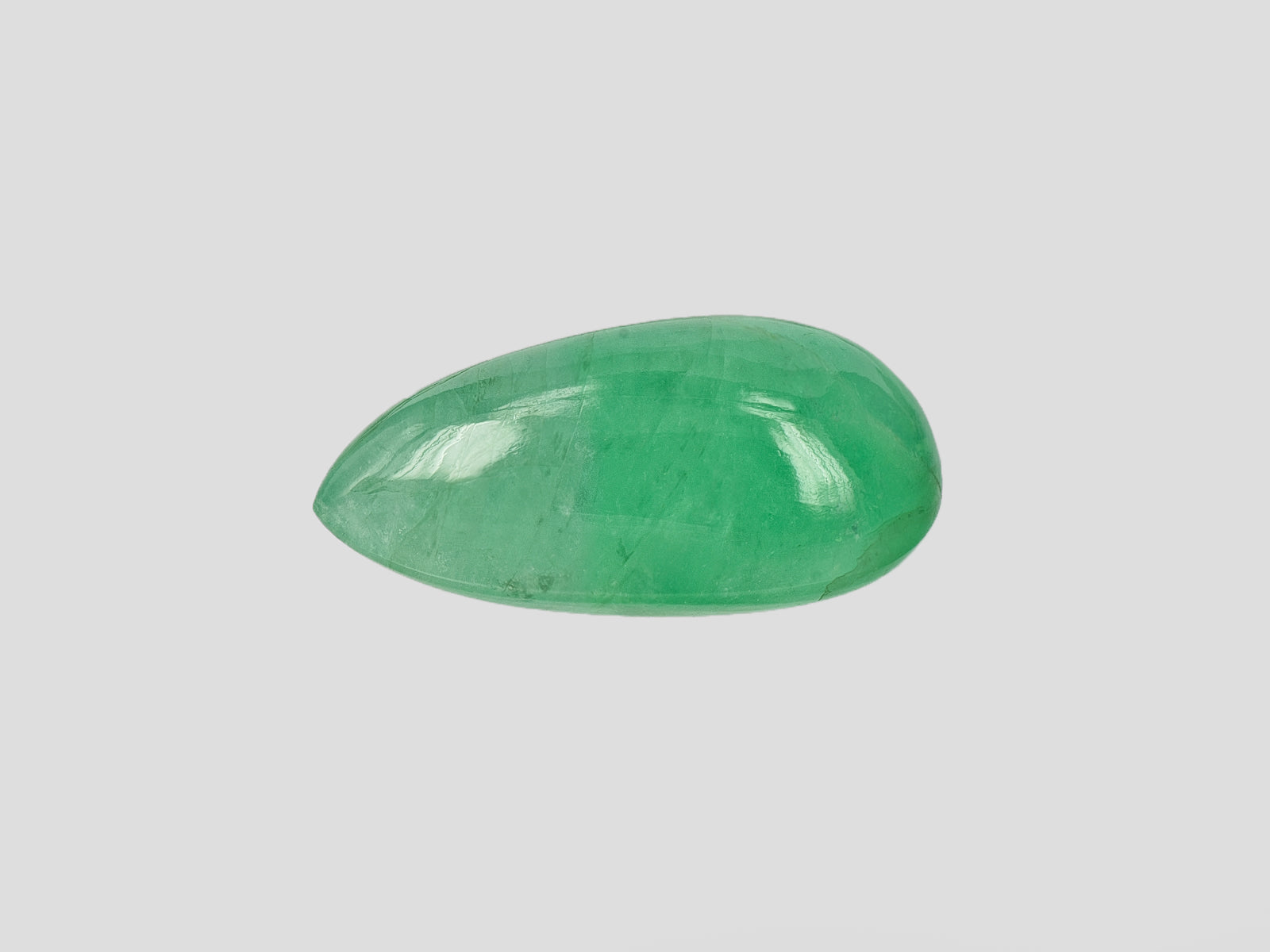 8802062-cabochon-lively-intense-green-russia-natural-emerald-12.51-ct
