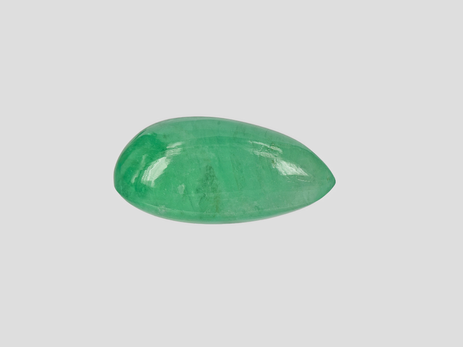 8802062-cabochon-lively-intense-green-russia-natural-emerald-12.51-ct