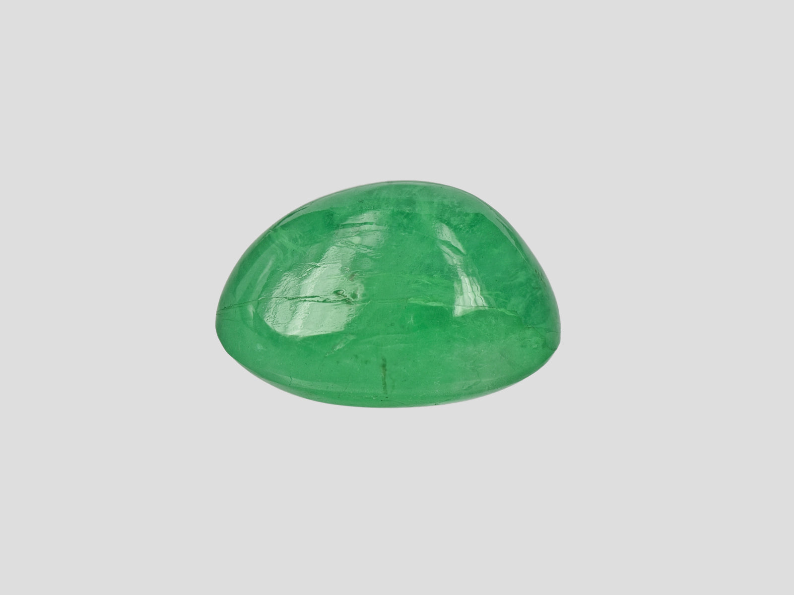 8802064-cabochon-lively-intense-green-russia-natural-emerald-13.55-ct