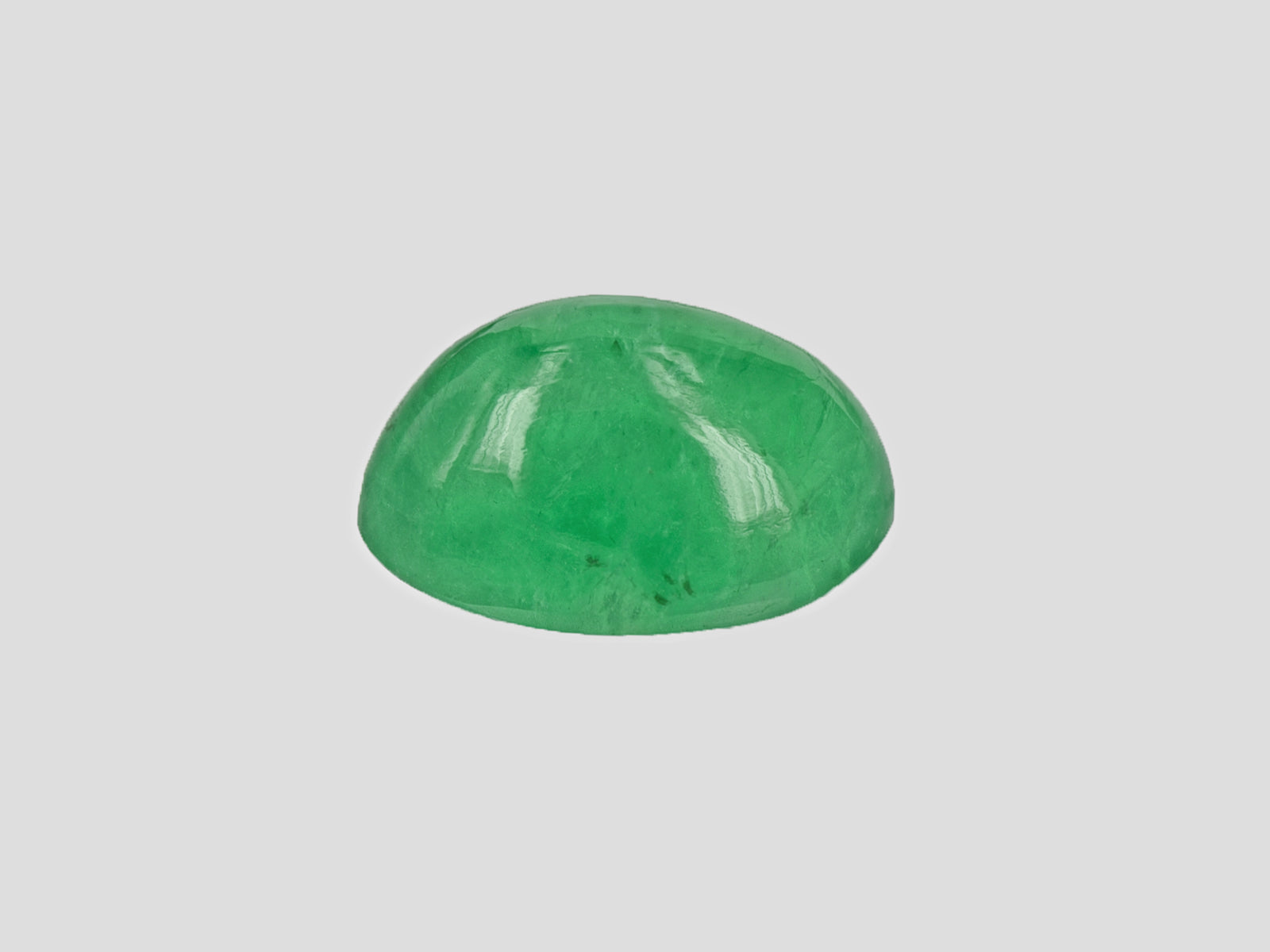 8802064-cabochon-lively-intense-green-russia-natural-emerald-13.55-ct
