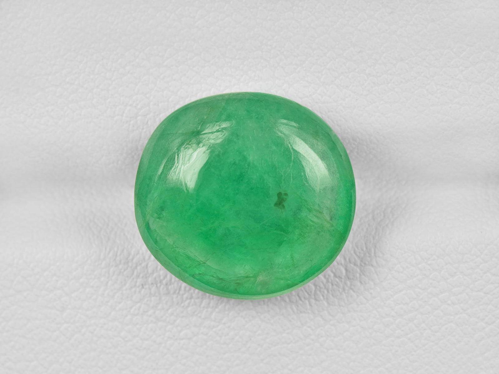 8802069-cabochon-lively-intense-green-russia-natural-emerald-11.03-ct