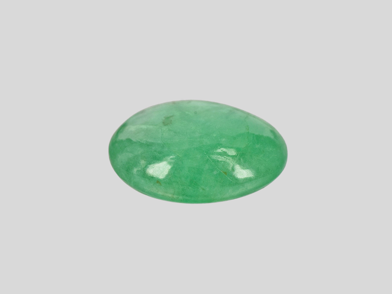 8802069-cabochon-lively-intense-green-russia-natural-emerald-11.03-ct