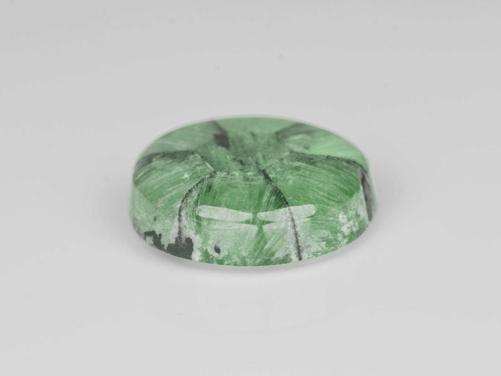 8802129-cabochon-soft-green-with-black-spokes-igi-colombia-natural-trapiche-emerald-7.55-ct