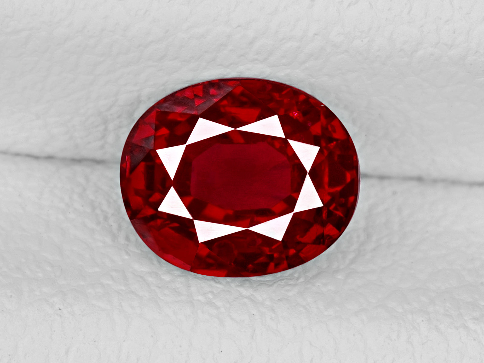 8802198-oval-fiery-vivid-pigeon-blood-red-grs-burma-natural-ruby-1.07-ct