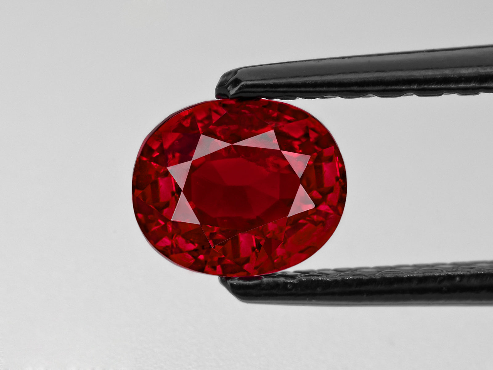 8802198-oval-fiery-vivid-pigeon-blood-red-grs-burma-natural-ruby-1.07-ct