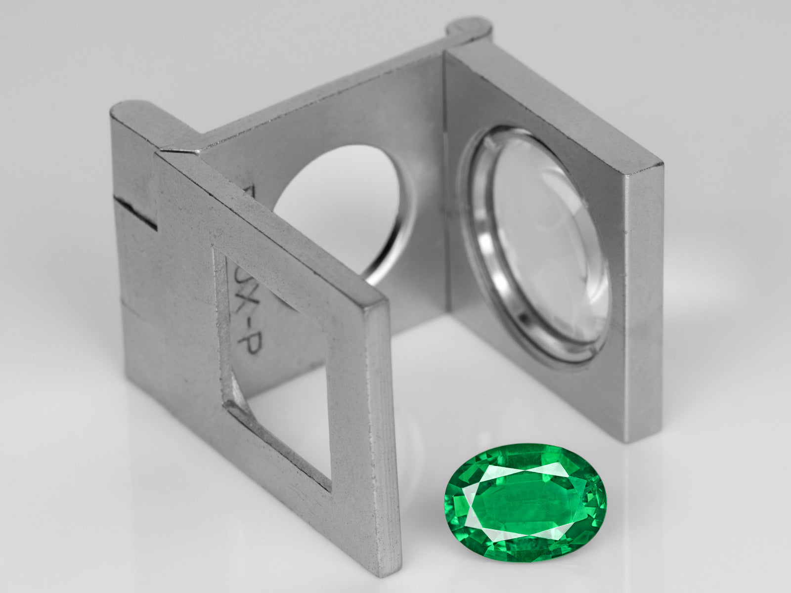 8802982-oval-lively-intense-green-gia-zambia-natural-emerald-2.57-ct