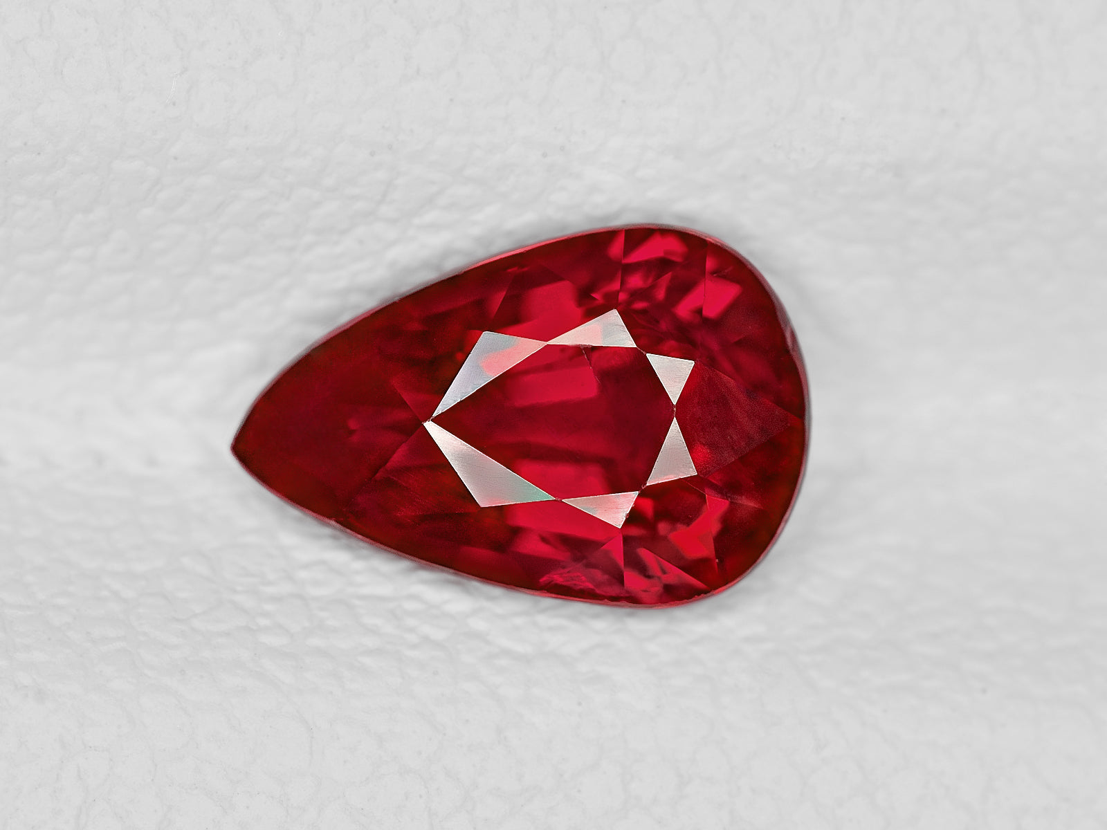 8802172-pear-fiery-vivid-pigeon-blood-red-grs-igi-mozambique-natural-ruby-1.29-ct