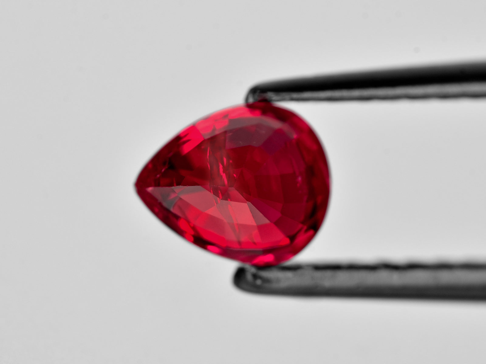 8802195-pear-fiery-vivid-pigeon-blood-red-mozambique-natural-ruby-1.12-ct
