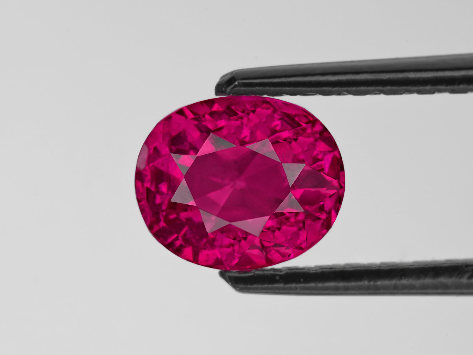 8802240-oval-fery-vivid-purplish-red-gia-afghanistan-natural-ruby-1.47-ct