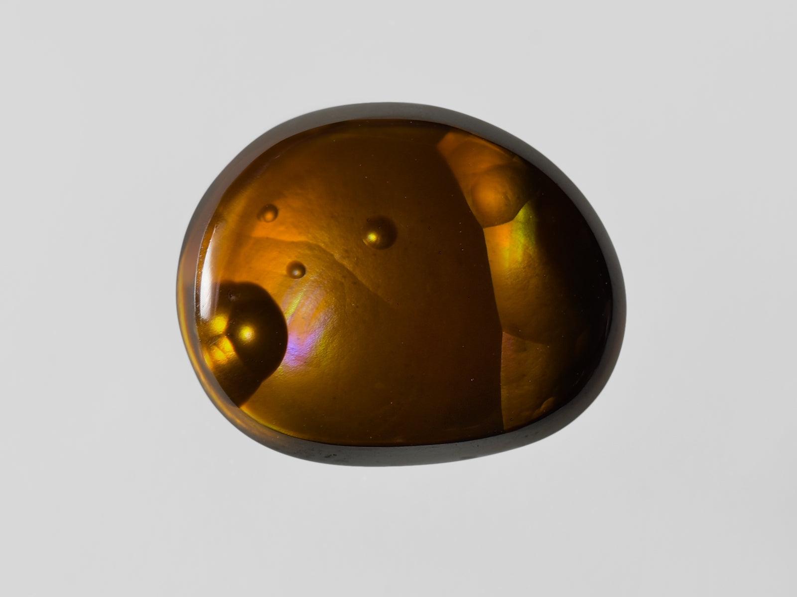 8802405-cabochon-brown-with-multi-color-swirls-&-bubbles-igi-mexico-natural-fire-agate-6.36-ct