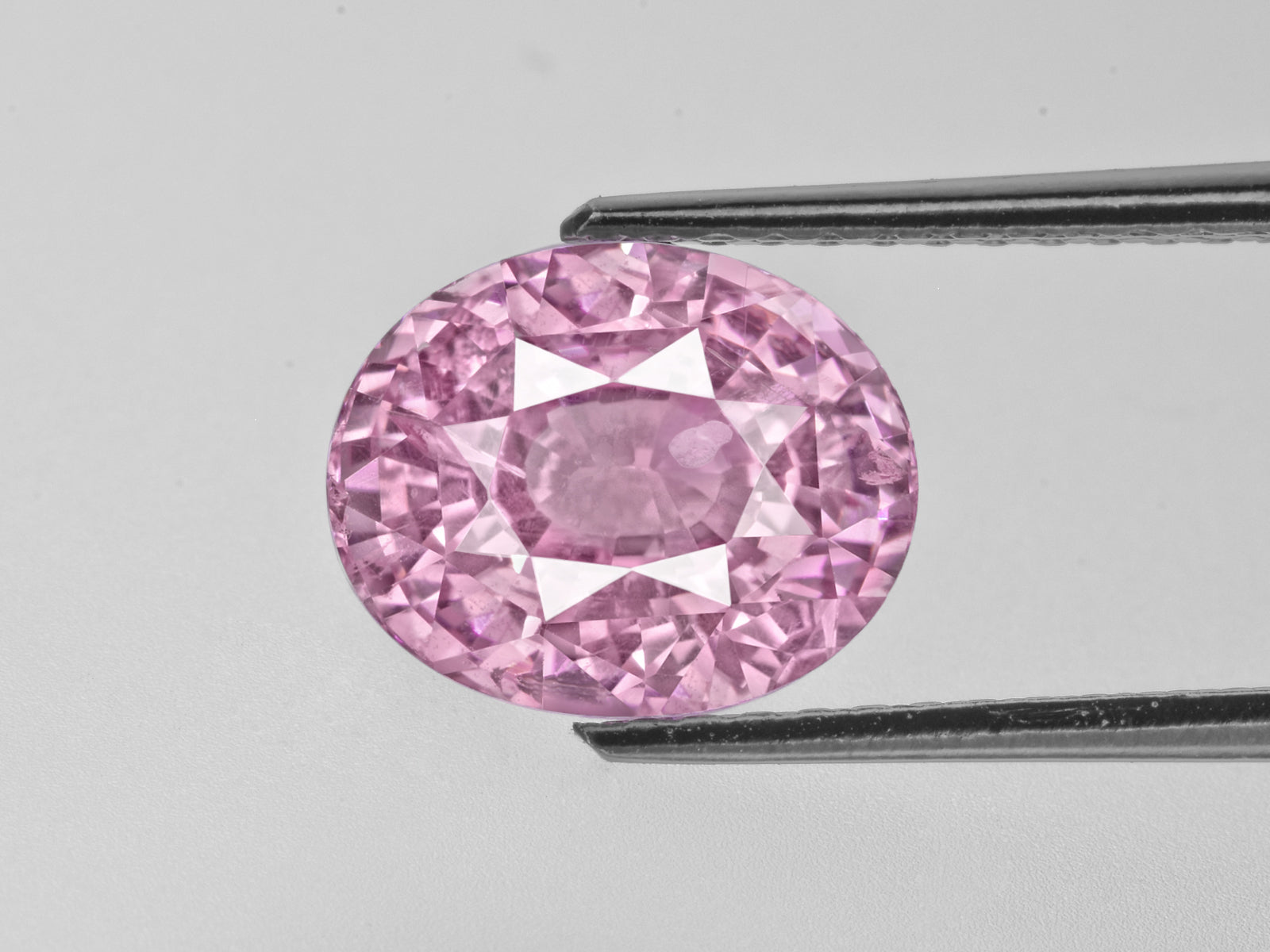 8802233-oval-lustrous-orangy-pink-grs-sri-lanka-natural-padparadscha-6.11-ct