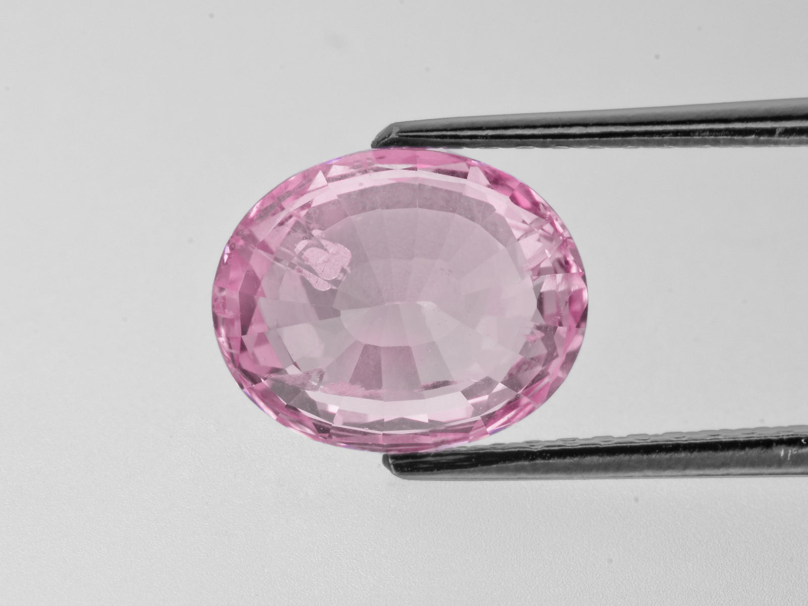 8802233-oval-lustrous-orangy-pink-grs-sri-lanka-natural-padparadscha-6.11-ct