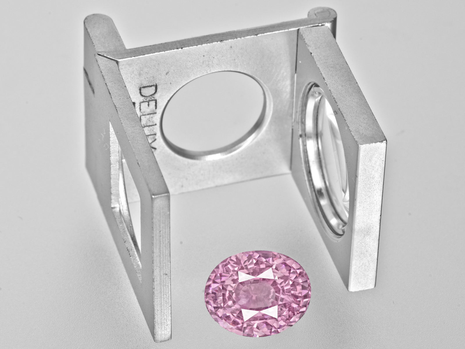 8802233-oval-lustrous-orangy-pink-grs-sri-lanka-natural-padparadscha-6.11-ct